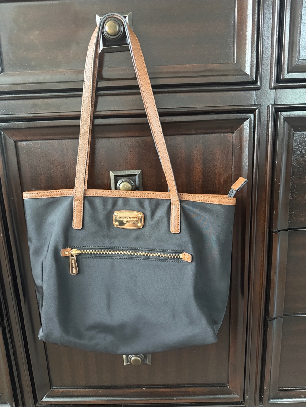 Michael Kors Black Tote with Brown Trim and Gold Hardware